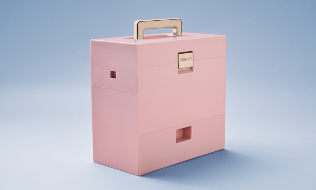 OSHEN makeup case made with ocean plastic. Pink and gold. Side view. Makeup storage. The IT beauty product of the year.